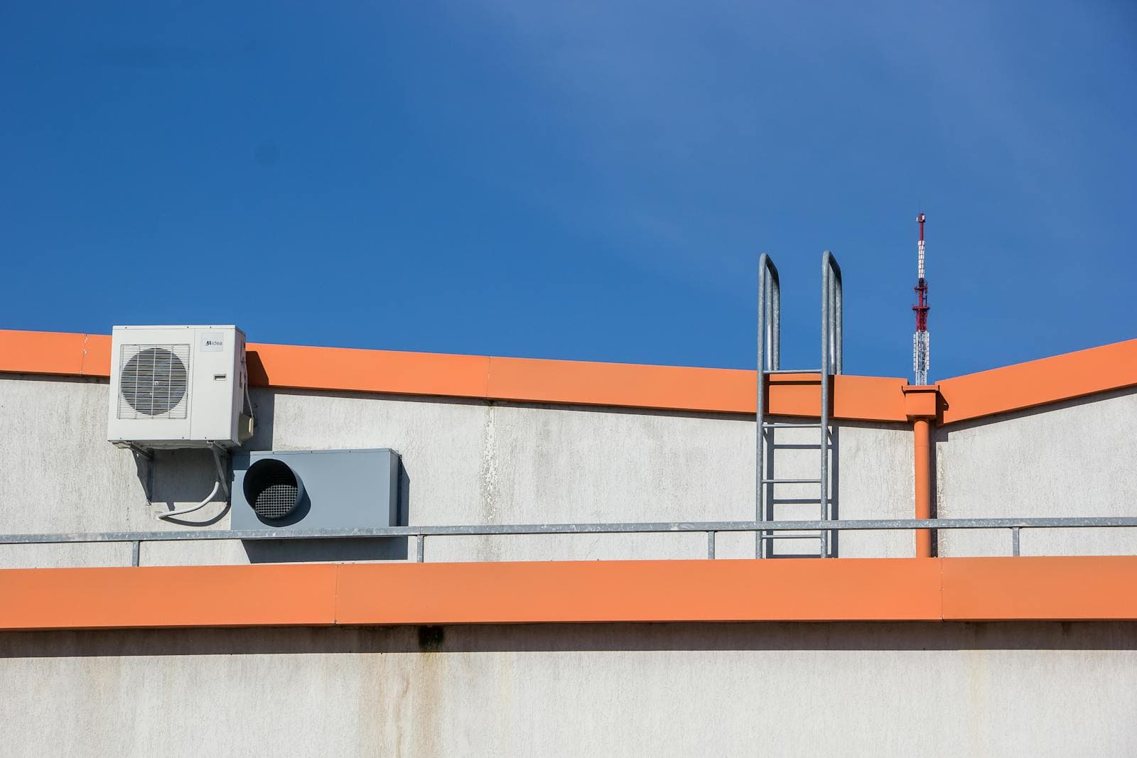 Rooftop HVAC unit and ladder