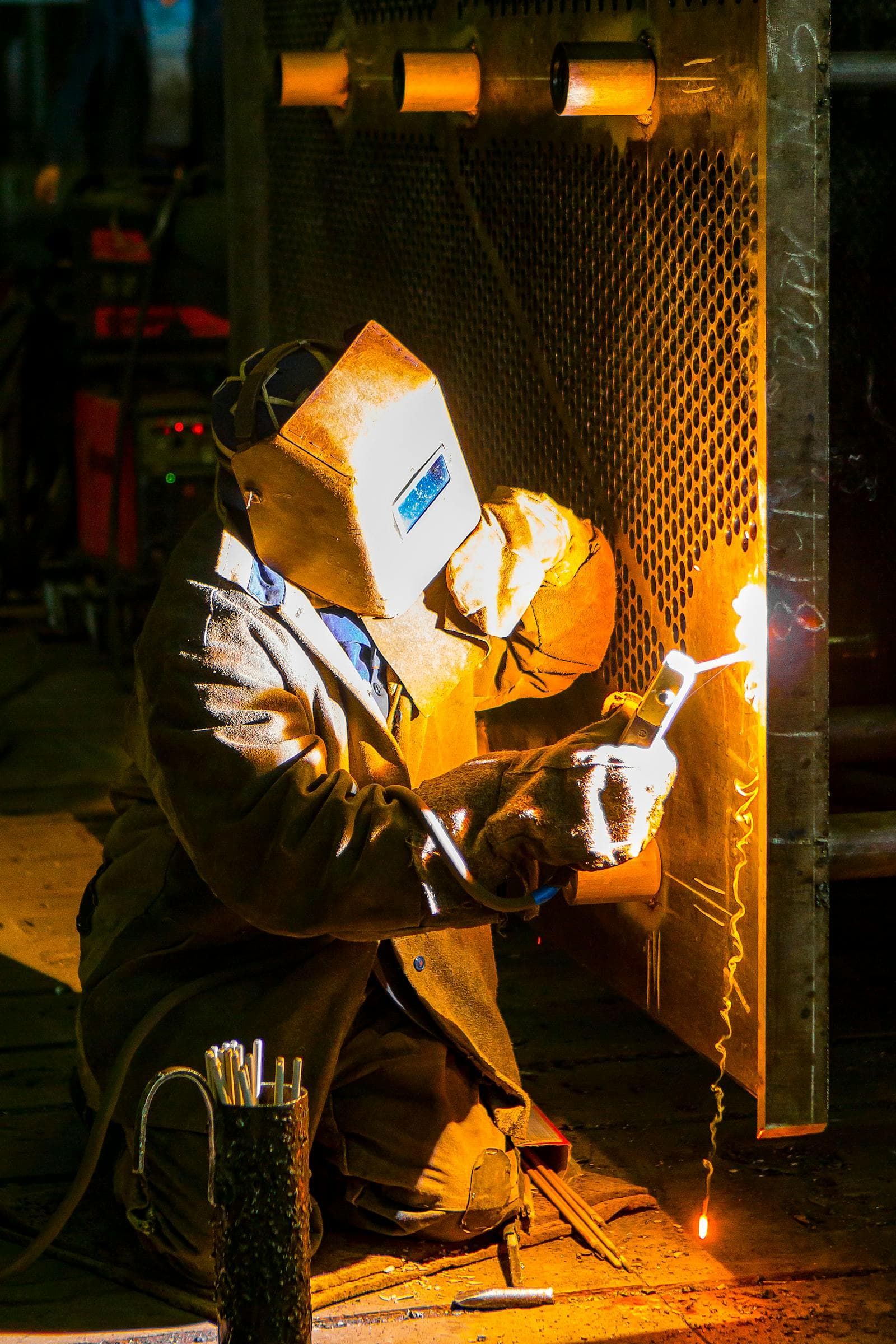 Shop welder with sparks